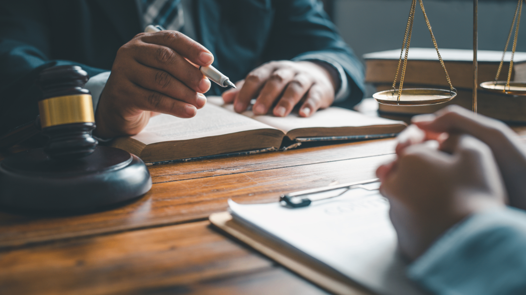Lawyer reviewing an estate plan with a client across a desk
