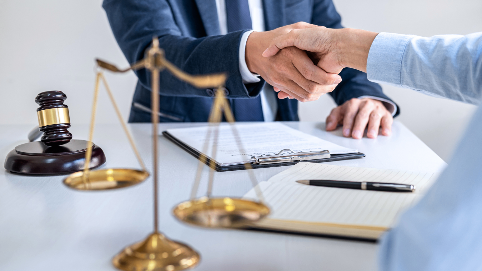 Tenant signing a commercial lease at a desk